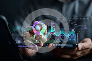 Analyst working with computer in Business Analytics and Data Management System to make report with KPI and metrics connected to