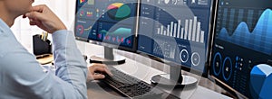 Analyst working on data analysis BI dashboard on computer monitor.Trailblazing