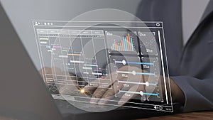 Analysts work with computers in management systems to create reports with KPIs and metrics connected to databases