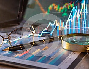 Analytical scrutiny of glowing stock graphs a close up on investment research and trends