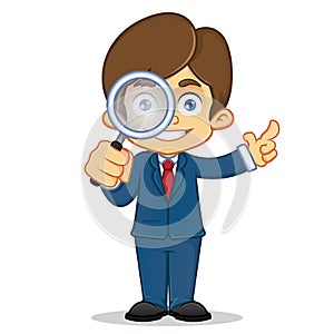 Businessman holding magnifying glass