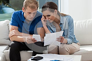 Analyzing family budget at home photo