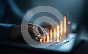 Analyzing Financial Growth Trends through Data Visualization on a Digital Workspace with a Keyboard and Graph Representation