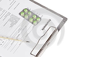 Anamnesis form on the clipboard