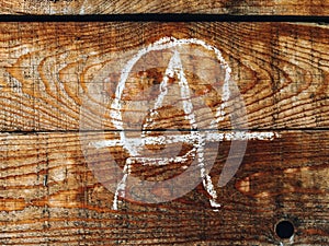 Anarchist symbol on wooden wall photo