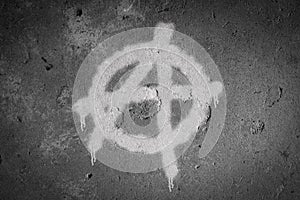 Anarchy symbol spray painted on the wall