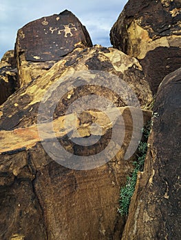 Anasazi petroglyphs at top of sandstone rock pile