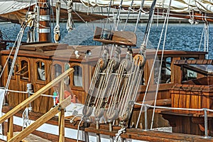 old wooden sailboat and lots of ropes
