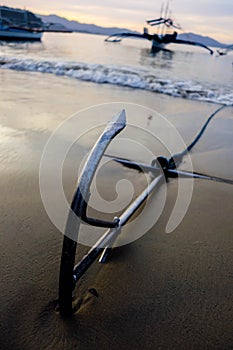 Anchor and a boat photo