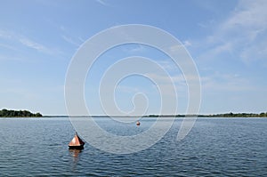 Anchor buoys specify borders on the lake