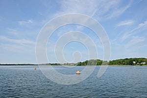 Anchor buoys specify borders on the lake