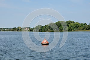 Anchor buoys specify borders on the lake