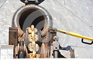 Anchor chain winch of a ferry boat.