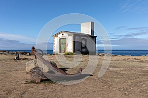 Anchor in front of Ruins of an old foghorn house on Yeu Island