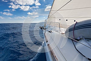 Anchor and furling drum on the yacht bow in sea