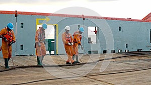 Anchor-handling tug supply AHTS vessel crew preparing vessel