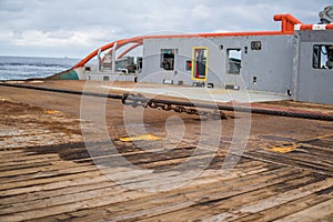 Anchor-handling Tug Supply AHTS vessel during towing