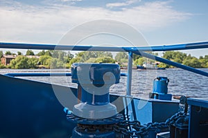 Anchor lowering and raising mechanism on a small vessel