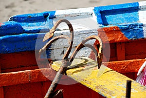 Anchor in an old fishing boat, Torremolinos. photo