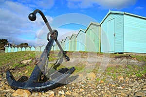 Anchor and row of colorful beach