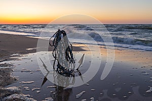 Anchor on the sandy shore of the Caribbean. Seascape at sunrise