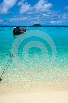 Anchored longtail taxi long tail boat,lipe island