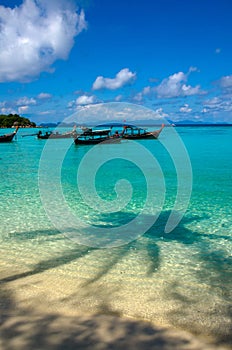 Anchored longtail taxi long tail boat,lipe island