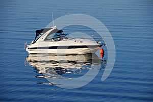 Anchored motor boat