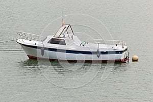 Anchored motor boat