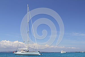 Anchored sailboat Formentera turquoise Illetes