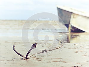 Anchored on the shore with boat