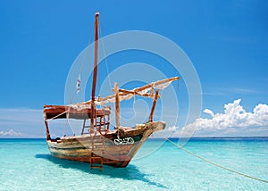 Anchored wooden dhow boat