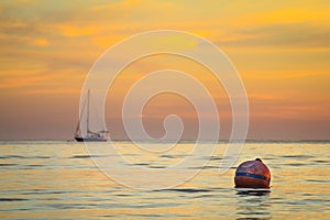 Anchored yatch sunset photo