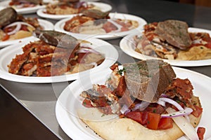 Anchovies with bread, onions and tomato