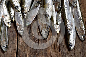 Anchovies (hamsi) on old table