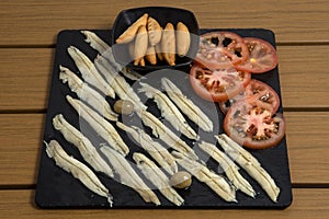 Anchovies in vinegar photo