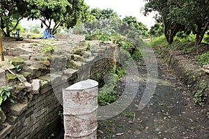 Anciant canal and brick wall in anciant Buddhist temple photo