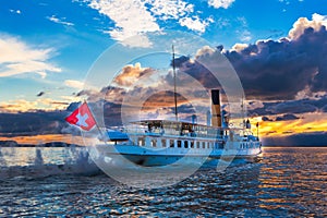 Ancien steam boat with swiss flag