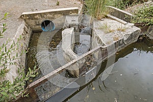 Ancient acequia or sequia a community-operated watercourse photo