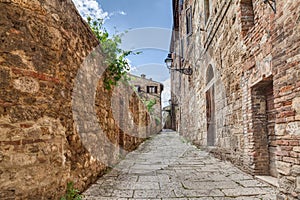 Ancient alley in Colle di Val d'Elsa, Tuscany, Italy photo