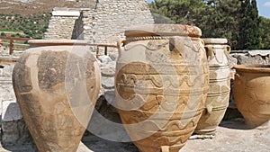 Ancient amphoras on the territory famous Knossos Palace of King Minos where, Theseus killed the Minotaur. The ruins of
