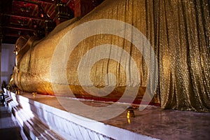 Ancient antique buddha reclining attitude statues of Wat Pa Mok Worawihan temple for thai people travelers travel visit and