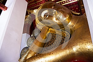 Ancient antique buddha reclining attitude statues of Wat Pa Mok Worawihan temple for thai people travelers travel visit and