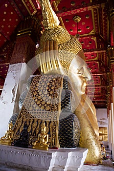 Ancient antique buddha reclining attitude statues of Wat Pa Mok Worawihan temple for thai people travelers travel visit and