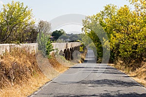 Aqueduct along the CC-142 to Pantano de Valdesalor, Spain photo