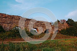 Ancient aqueducts at Parco Degli Acquedotti. Stone arches built to carry water into the city during the Roman Empire.