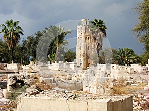 Ancient Arab cemetery with ancient tower in the background