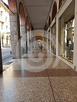 An ancient arcade of a building in Bologna city Italy