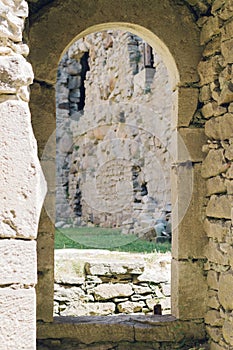 Ancient arch doorway in construction of medieval castle