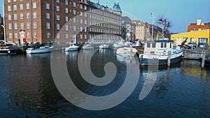 Ancient architecture with waving flag in Copenhagen harbor, Scandinavian tourism